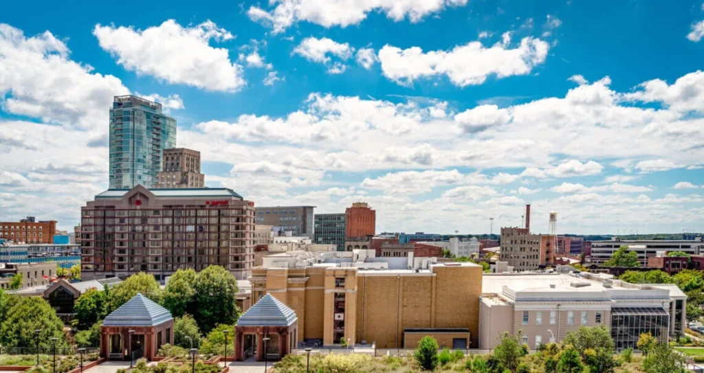 Charlotte skyline as the backdrop for luxury chauffeur service routes.