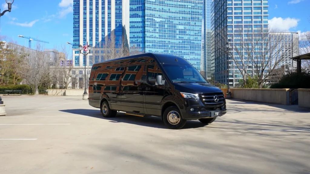 Executive sprinter van parked downtown, ready for business transportation.